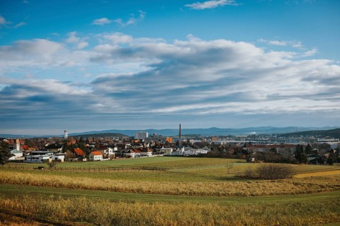 Panorama with city, fields and mountains under variable sky, Ternitz, Lower Austria, Austria