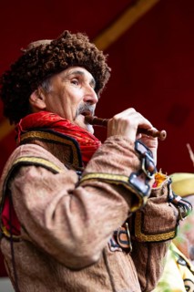 Flute player, musician, medieval clothing, medieval market, city of Esslingen, district of