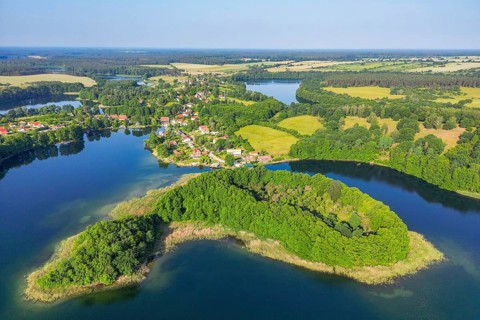 Aerial view, drone photo: Carwitz village and GÃ¤nsewerder island on Lake Carwitz behind the lake