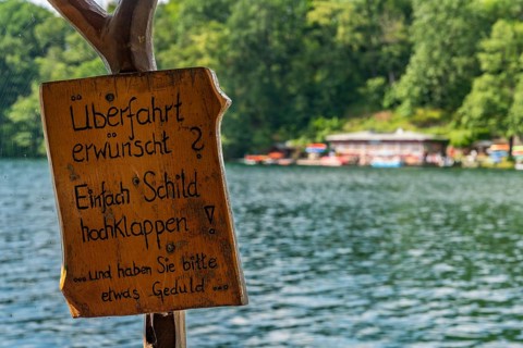 Crossing sign required, ferry station, canoe rental and cafÃ© am See Schmaler Luzin, Hullerbusch