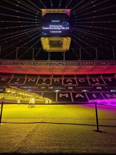 The Frankfurt Waldstadion (Deutsche Bank Park) is illuminated in red to mark the founding of the