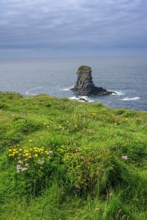 Rock nose in the sea called Candle Stick, Kilkee, County Clare, Ireland