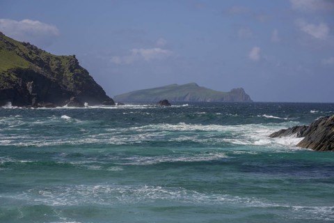 Waves crashing against cliffs in the background Inishtooskert Island (sleeping Giant), Clogher