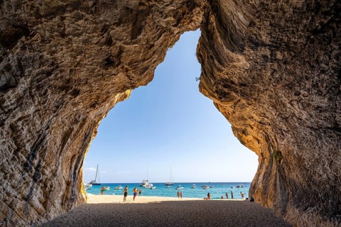 Rock cave on the beach at Cala Luna, Golfo di Orosei, Baunei, Sardinia, Italy