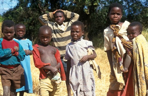Children posing for the camera on the side of the road, Bwangu Mzimba, Malawi, Africa, June 2000,