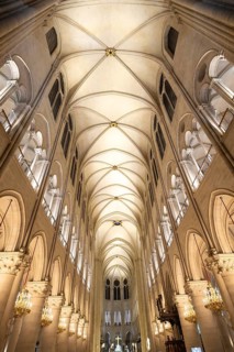 Notre dame cathedral in paris, france, exhibiting its magnificent gothic architecture, vaulted
