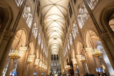 Notre dame cathedral interior in paris, france, displaying the grand gothic architecture with