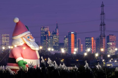 In a Christmas tree center near Frankfurt am Main, a multi-metre-high inflated figure of Santa