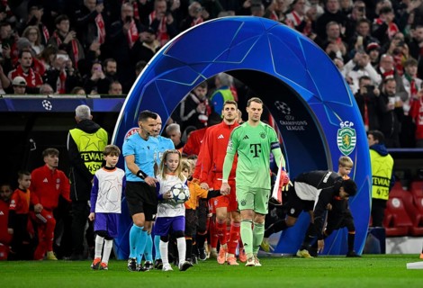 Teams enter the pitch through CL Arch arch Referee Referee Nicholas Nick Walsh (SCO) and children's