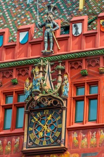 Exterior view of the magnificent clock at the Red Town Hall, Market Square, Basel