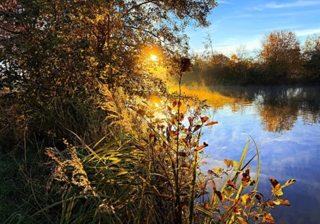 Atmospheric sunrise over the Lippe river in autumn, Lippeaue, Lippstadt, North Rhine-Westphalia,