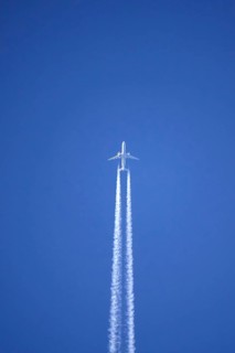 Airplane with contrails, Germany