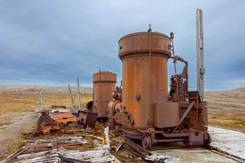 Steam engine at abandoned marble quarry Camp Mansfield, Ny London near Ny-Alesund,