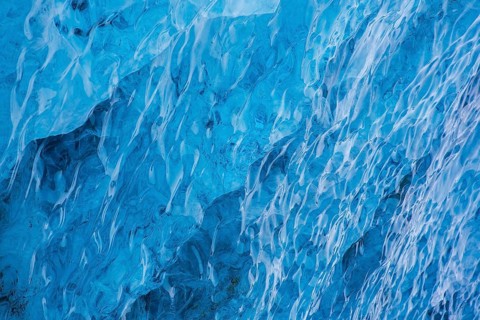 Close-up of compressed, smooth melting blue ice structure inside glacier, Spitsbergen / Svalbard,