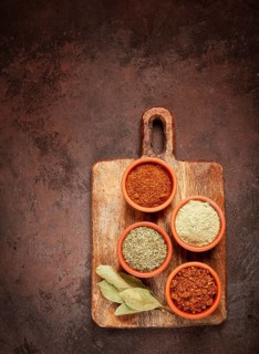 Georgian spices, in ceramic bowls, assortment, set of spices, utsho, adjika, Svan salt, ground