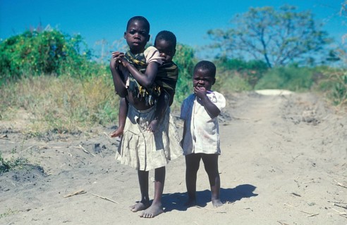 Girl with younger siblings near Kande Beach, Malawi, Africa, July 2000, vintage, retro, old,