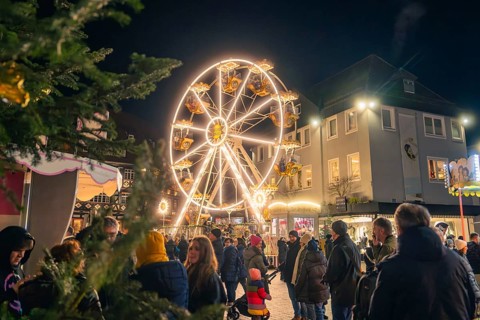 Lively Christmas market with brightly lit Ferris wheel, Christmas market 2025, Nagold, Black