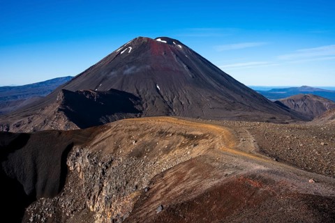 Mount Ngauruhoe and the Tongariro Alpine Crossing hiking trail in Tongariro National Park. North