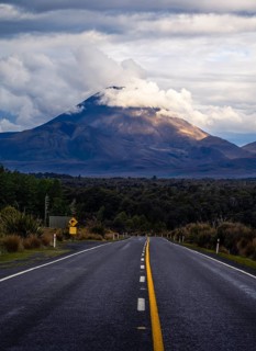 Roadshot, Mount Ngauruhoe evening at sunset, road SH 47. Tongariro National Park, North Island, New