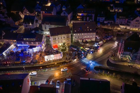 Night view of a lively village with illuminated road junctions, Aidlingen Christmas market,