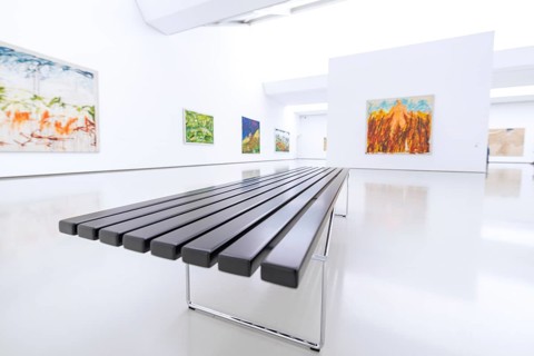 Modern works of art in a bright gallery with minimalistically designed bench, Open Horizons