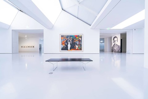 Bright, minimalistic gallery with large paintings and a bench in modern style, Open Horizons