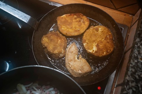 Breaded schnitzel of giant bovista (Bovista) in a pan, Mecklenburg-Vorpommern, Germany