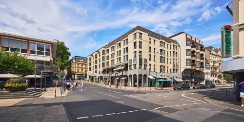 General architecture, residential and commercial buildings, pedestrian zone, barrier bollards,