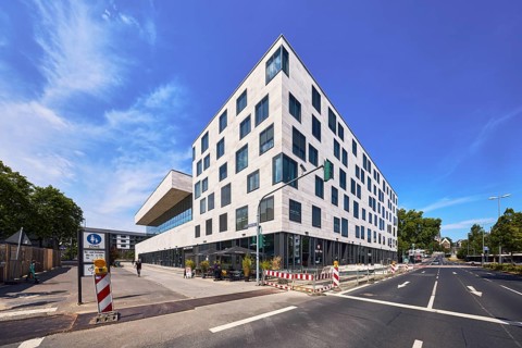 Pedestrian zone, road markings lanes, directional arrows, traffic lights, general architecture,