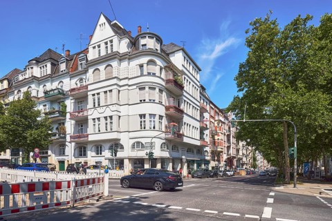 Historic residential buildings, general architecture, fenced construction site, barrier, road
