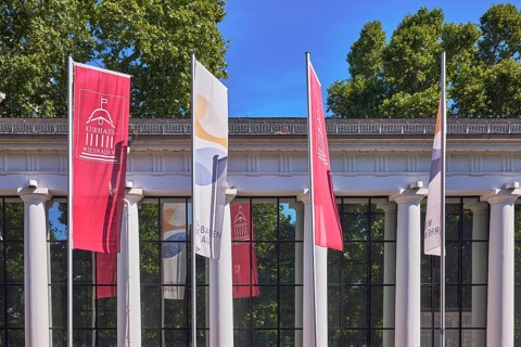 Spa hotel colonnades, colonnades, flags on flagpoles, spa hotel Wiesbaden, historic building,