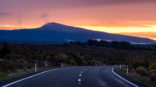 Roadshot, landscape and road SH 47 at sunset, Mount Hauhungatahi in the background. Tongariro