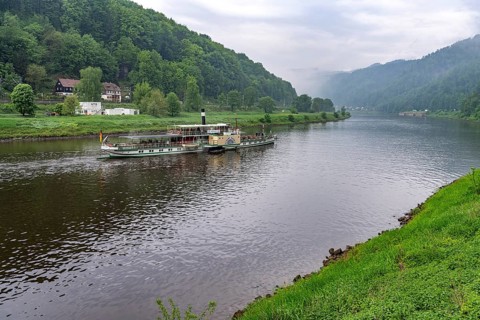 The paddle steamer Kurort Rathen on the Elbe between Germany and the Czech Republic near HÅ™ensko,