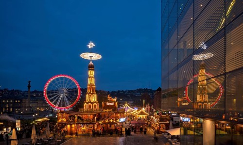 Night view, Christmas market with Christmas pyramid, reflection in the art museum, cube, Ferris