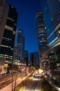 La defense financial district in paris at twilight, modern glass skyscrapers with illuminated