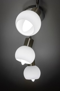 Modern ceiling lamp with three white, bowl-shaped lights