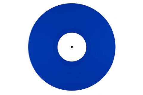 Blue vinyl record with a white label in the middle on a white background