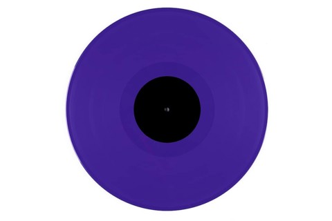 Purple vinyl record with a black label in the middle on a white background