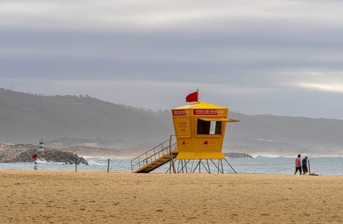 Yellow lifeguard surveillance container on Nazare beach, Portugal