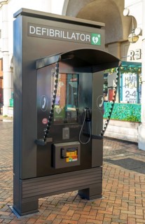 JCDecaux modern public access defibrillator station kiosk communication hub, town centre of