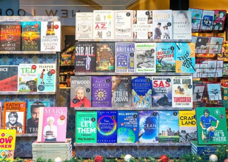 Books in window display of Waterstones bookshop, Ipswich, Suffolk, England, UK
