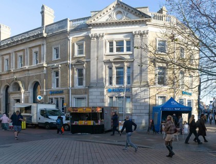 Barclays Bank building food stalls Princes street pedestrianised area, town centre of Ipswich,