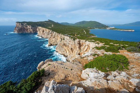 Steep cliffs by the sea, coastal landscape, cliffs on the Capo Caccia headland, Alghero, Sardinia,
