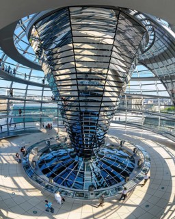 Interior view with fisheye effect of the glass dome of the Reichstag building with the cone-shaped