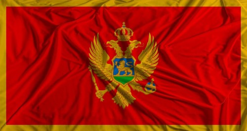 Montenegro flag with fabric texture background. National flag of Montenegro with cloth texture