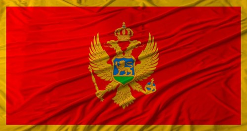 Montenegrin flag waving. Flag of Montenegro with cloth texture