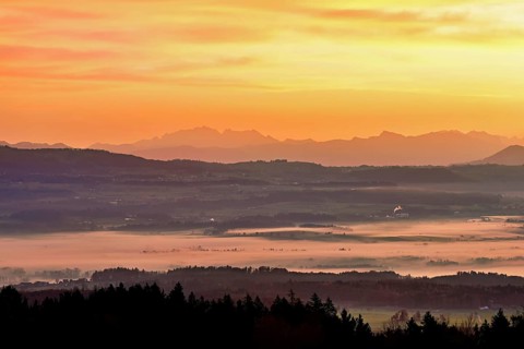 View from Horben of the Reuss Valley covered in fog, behind it the Alpstein with the SÃ¤ntis in the