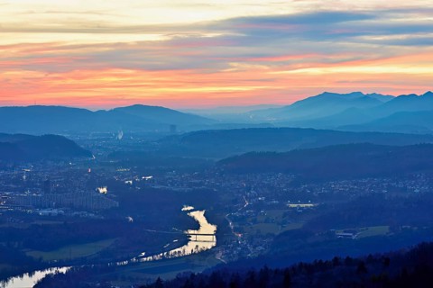 View of the Jura foothills from the Gisliflue, in the light of the setting sun, in the foreground