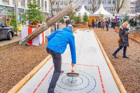 Curling competition with several people as spectators in the background, Sindelfingen, Böblingen