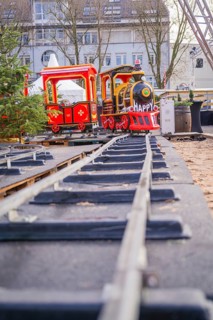 A toy train on rails in a Christmas setting with festive colors, Sindelfingen, Böblingen district,